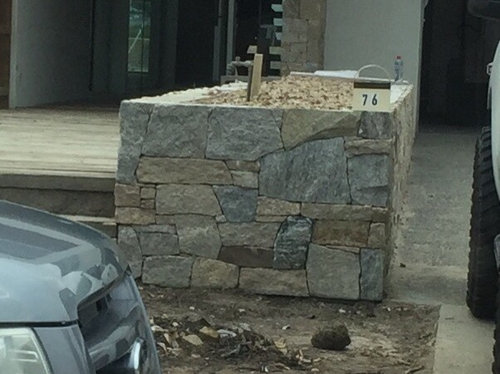 Retaining wall: Solid stone vs besser block with stone ...