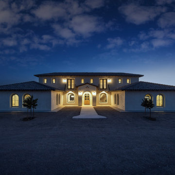 Front Elevation at Night | Tuscan Farmhouse