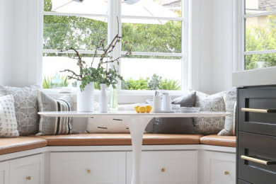 Dining room - coastal dining room idea in Orange County