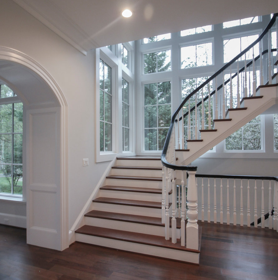 Powerful Impression by Floating Staircase in Suburban Foyer