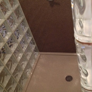 Solid surface walls base and glass block shower in Cleveland Ohio
