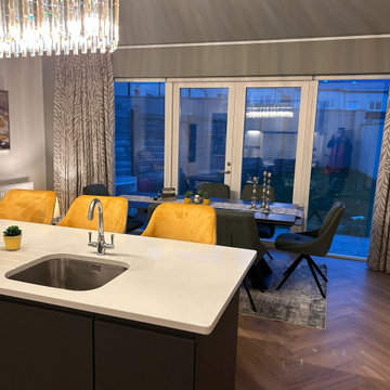 Open plan kitchen with a pop of colour