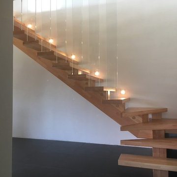 Escalier a limon central en bois