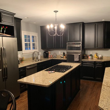 cabinet refacing-----black cabinets with granite