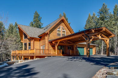 Mountain style home design photo in Other
