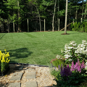 Backyard Makeover Installing Sod, Privacy Hedge, Flower Garden, Gravel Driveway