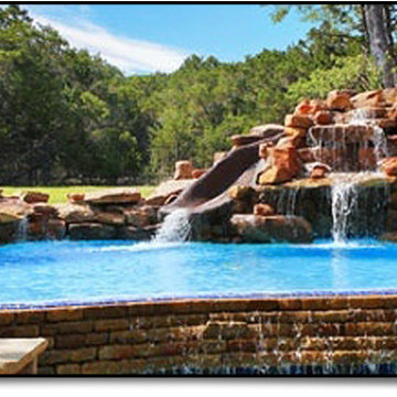 Pool with large Negative edge and Rock Waterfall with slide