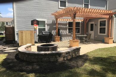 Example of a mid-sized mountain style patio design in Charleston