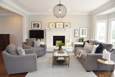 Transitional family room in Chicago with grey walls.