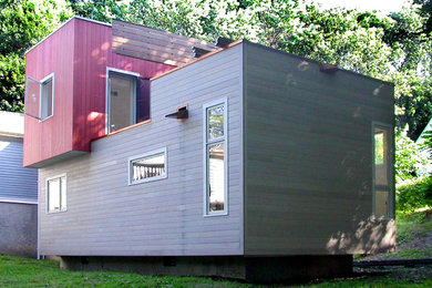 Photo of a contemporary exterior in Boston with wood siding.