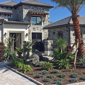 Traditional Exteriors Featuring Stone