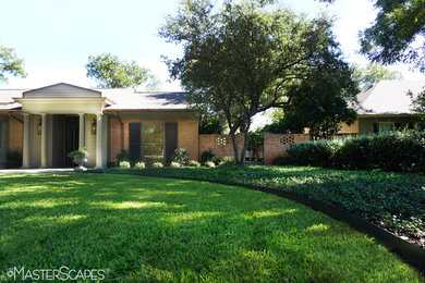 This is an example of a backyard landscaping in Other.
