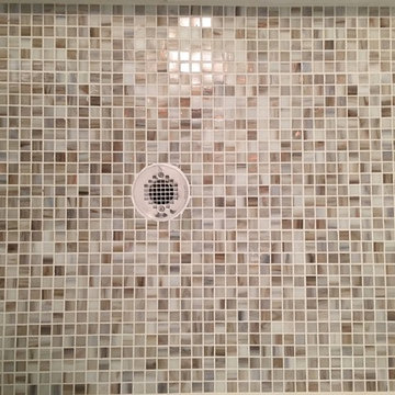Fiberglass shower replacement with tile shower.