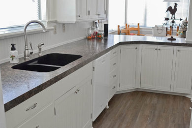 Example of a farmhouse kitchen design in Wichita