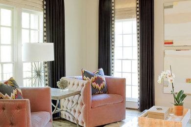 Living room - mid-sized transitional formal and enclosed medium tone wood floor living room idea in Atlanta with white walls, no fireplace and no tv
