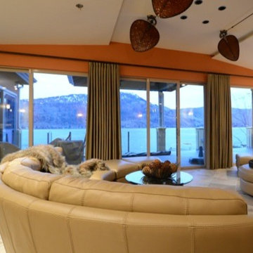 A combination of drapery & blinds for a lakefront home
