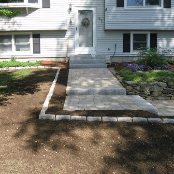 Unilock Brussels paver for walk and Salt & Pepper GRanite steps