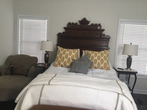 bed in between two windows