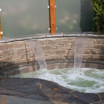 Inground Spa with Waterfall, Patio and Privacy Screens