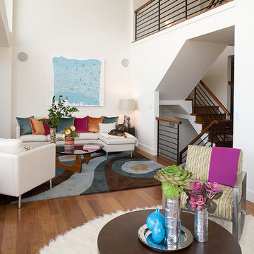 Hillside Sanctuary:  White living room by Kimball Starr Interior Design