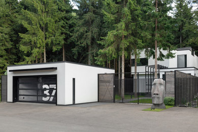 Medium sized contemporary detached double carport in Moscow.