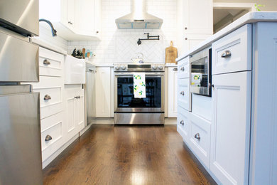 Example of a transitional kitchen design in New York