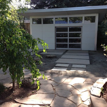 Poured concrete pavers to Studio Shed garage
