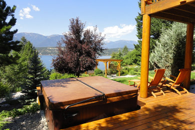 Example of a mountain style home design design in Vancouver