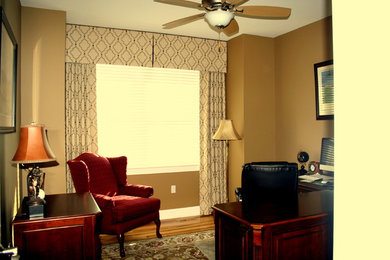 Example of a transitional home office design in Philadelphia