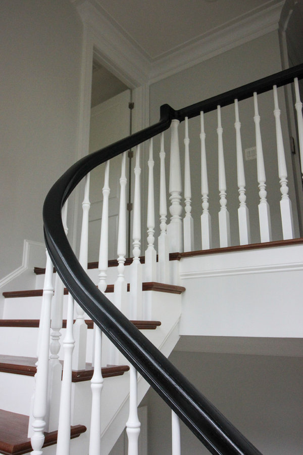 Powerful Impression by Floating Staircase in Suburban Foyer