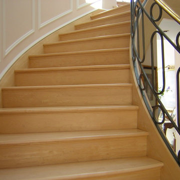 NATURAL MAPLE STEPS AND METAL AND BRASS RAILING