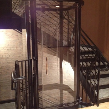 Glass Elevator in Staircase