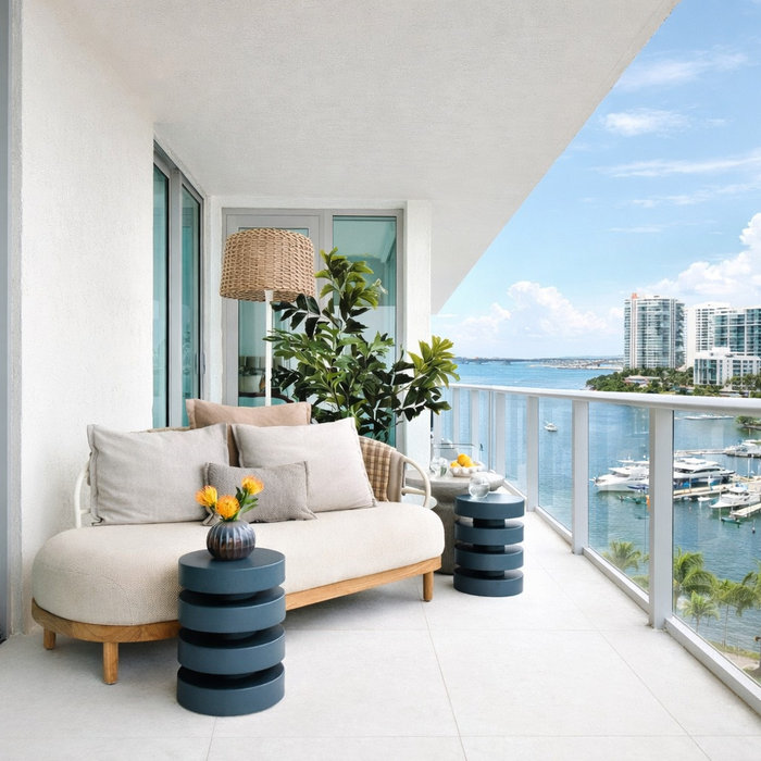 Modern coastal condo balcony overlooking Sarasota Bay, showcasing refined finishes and thoughtful Modern coastal condodesign typical of high-end condominium remodeling in Sarasota and Venice, Florida.