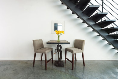 Inspiration for a small industrial staircase remodel in Houston