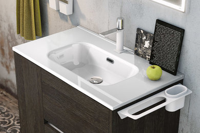 Bathroom - modern bathroom idea in Calgary with medium tone wood cabinets, solid surface countertops and white countertops