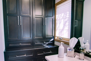 Mid-sized transitional master white tile porcelain tile bathroom photo in Other with shaker cabinets, dark wood cabinets, an undermount sink and solid surface countertops