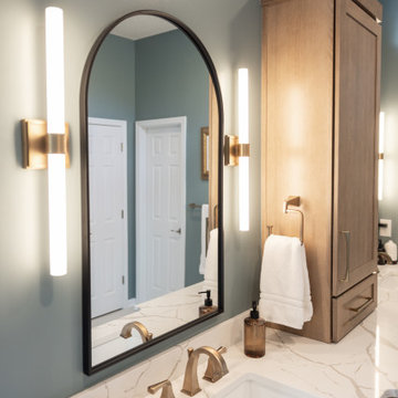 Spa Like Primary Bathroom Remodel with Warm Wood & Brass Details