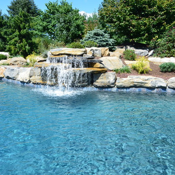 In Ground pool with Boulder Waterfall and Large Spa