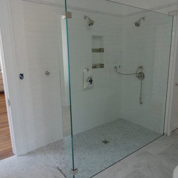 Custom Glass Spray Panels, Splash Guards, and Fixed Panel Shower Units