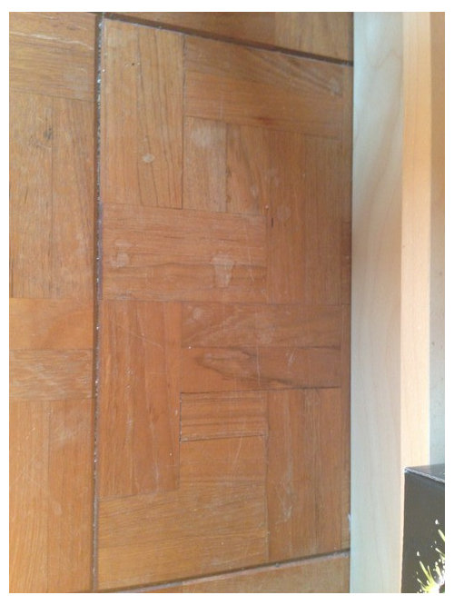 Fixing damage to teak parquet water spots?