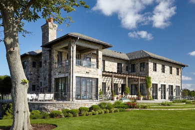 Example of a tuscan house exterior design in New York