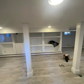 Basement Renovation (Custom Shelving, Flooring, and Bathroom)