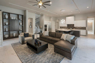 Inspiration for a mid-sized contemporary open concept living room in Orlando with grey walls, marble floors and white floor.