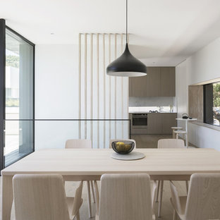 Inspiration for a modern open plan dining in Sydney with white walls, light hardwood floors, no fireplace and beige floor.