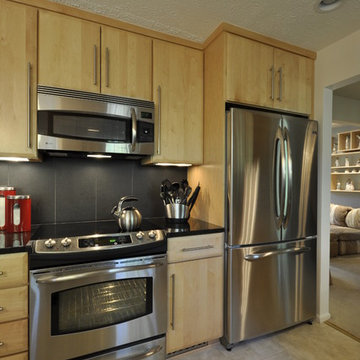 Kitchen with Black Granite Countertops