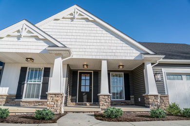 Example of an arts and crafts exterior home design in Cleveland