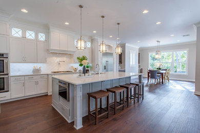 This is an example of a large transitional kitchen in Orlando.
