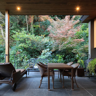 東京23区のエクレクティックスタイルのおしゃれなテラス・中庭 (アウトドアキッチン、張り出し屋根) の写真