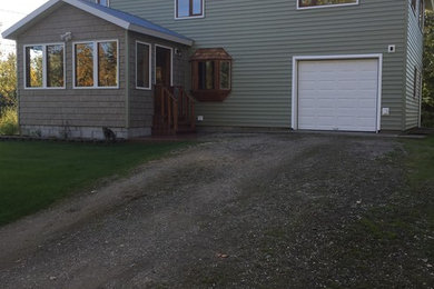 Example of a classic exterior home design in Other
