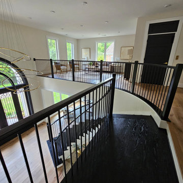 Project #130 | Curved Staircase with Wraparound Balcony
